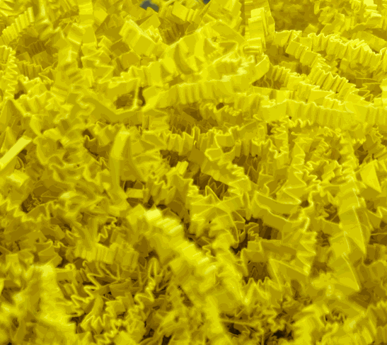Yellow crinkle cut shred for packaging and presentation.
