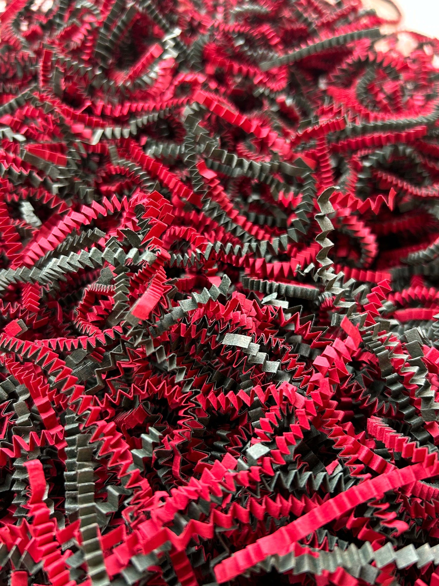 40 LB box of dark green and red Christmas crinkle paper.