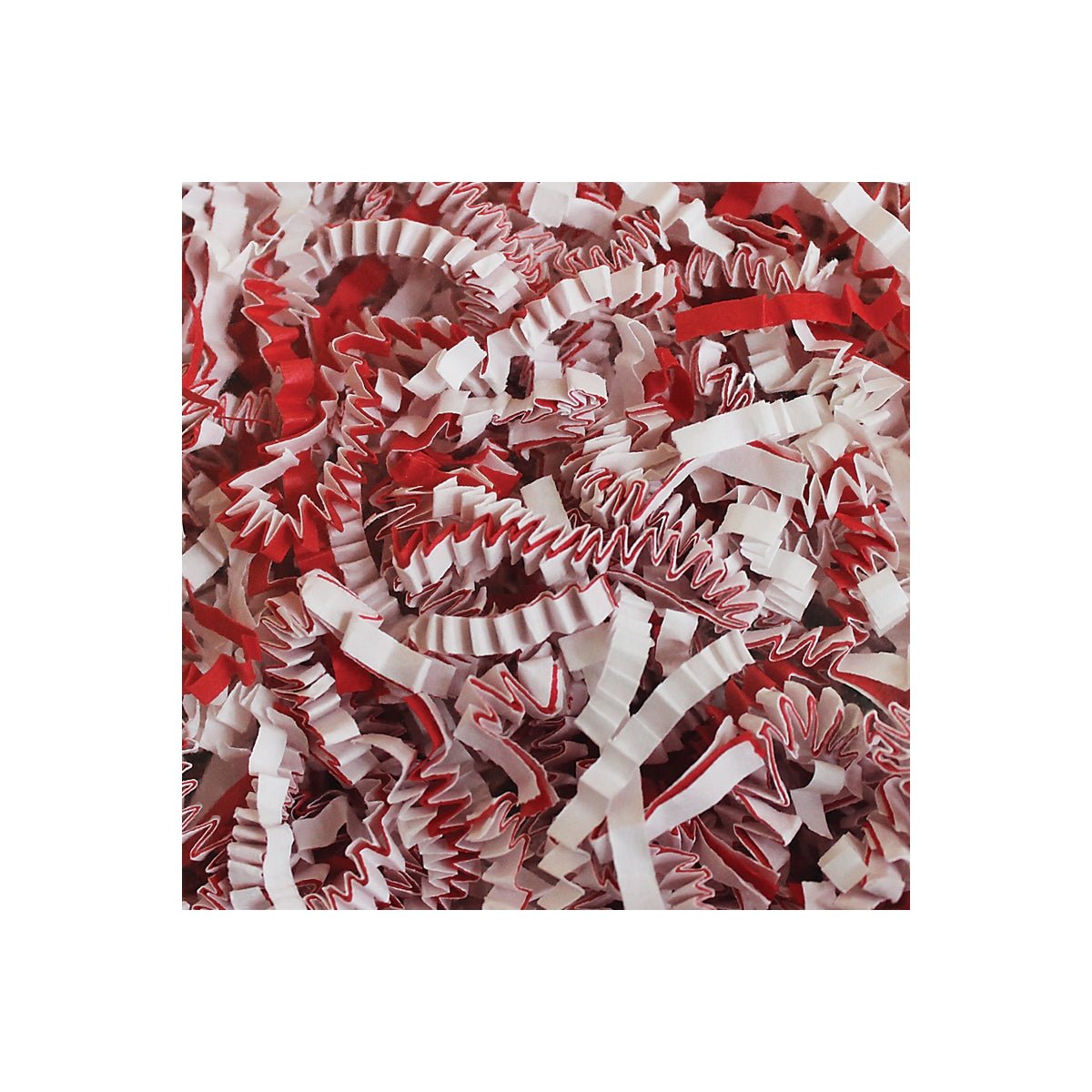 Red and white crinkle cut shred resembling candy canes