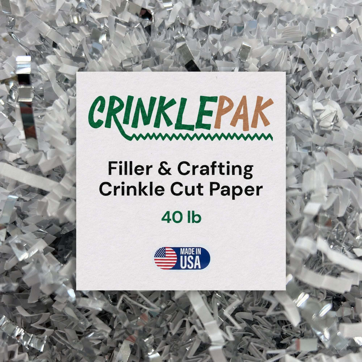 Crinkle cut paper filler in silver and white metallic strips, labeled CrinklePak 40 lb; 40lb Silver & White for packaging.