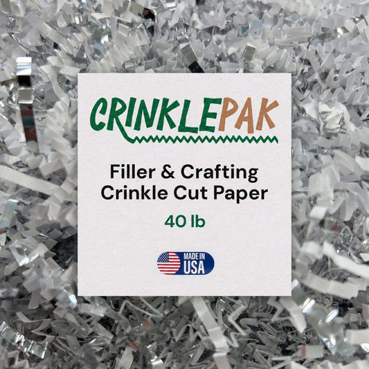 Crinkle cut paper filler in silver and white metallic strips, labeled CrinklePak 40 lb; 40lb Silver & White for packaging.