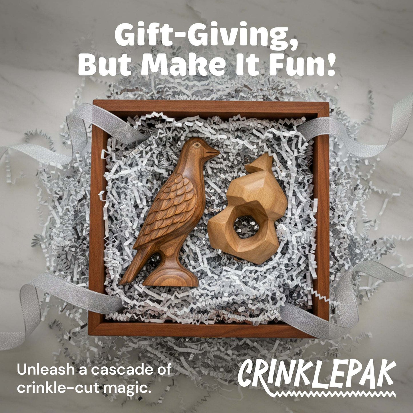 Premium white silver crinkle paper filler in gift box with wooden bird and sculpture accents