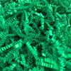 Green crinkle cut paper shred for packaging and gift presentation.