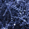 Close-up of 40 LB navy blue shredded paper filler with crinkle cut texture for packaging and cushioning.