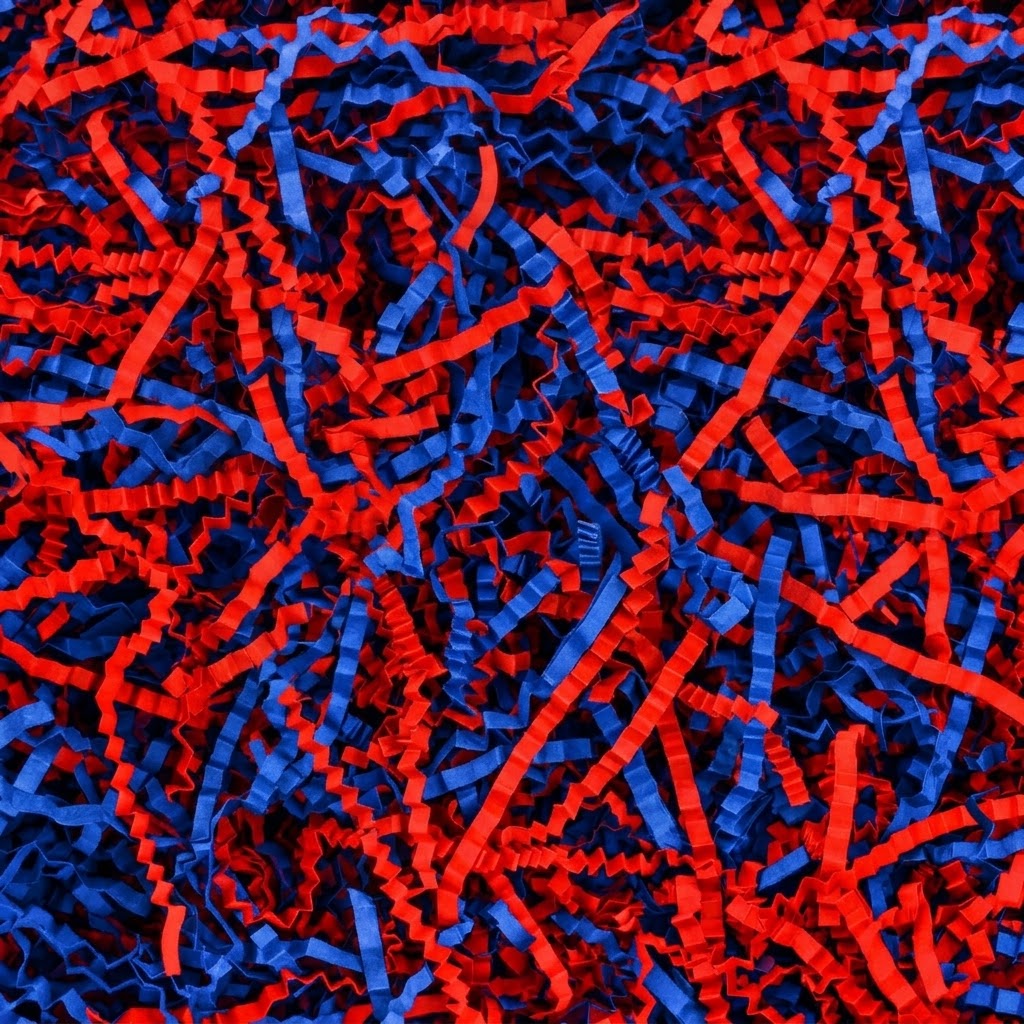 NORTH SIDE CRINKLE PAPER in vibrant red and blue shredded strips with a crinkled texture for filling packages