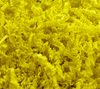Bright yellow crinkle cut shred for packaging in a 10 lb box, ideal for gifts and cushioning items.