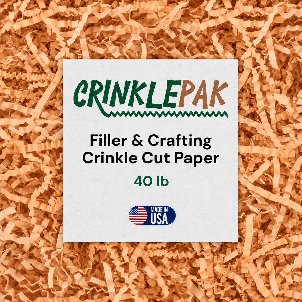 Peach Crinkle Paper filler with crinkle-cut texture in a soft peach color surrounding a white label showing brand and product details