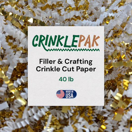 Crinkle paper filler in white and metallic gold, with narrow zigzag-cut strands; 40 lb White and Gold bulk pack.